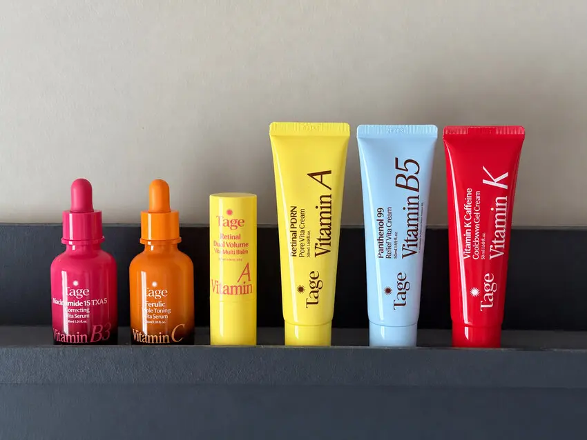 Tage Vita range lined up on a shelf, including the retinal stick, retinal pore cream, and the B3, C, B5 and K products