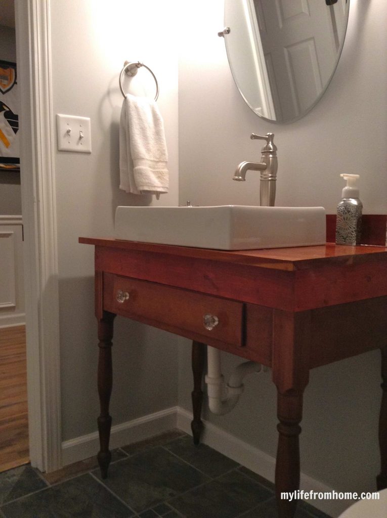 Finished vanity Antique Table with Sink by www.whitecottagehomeandliving.com