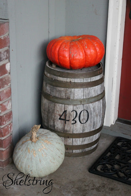 Pumpkins and barrel