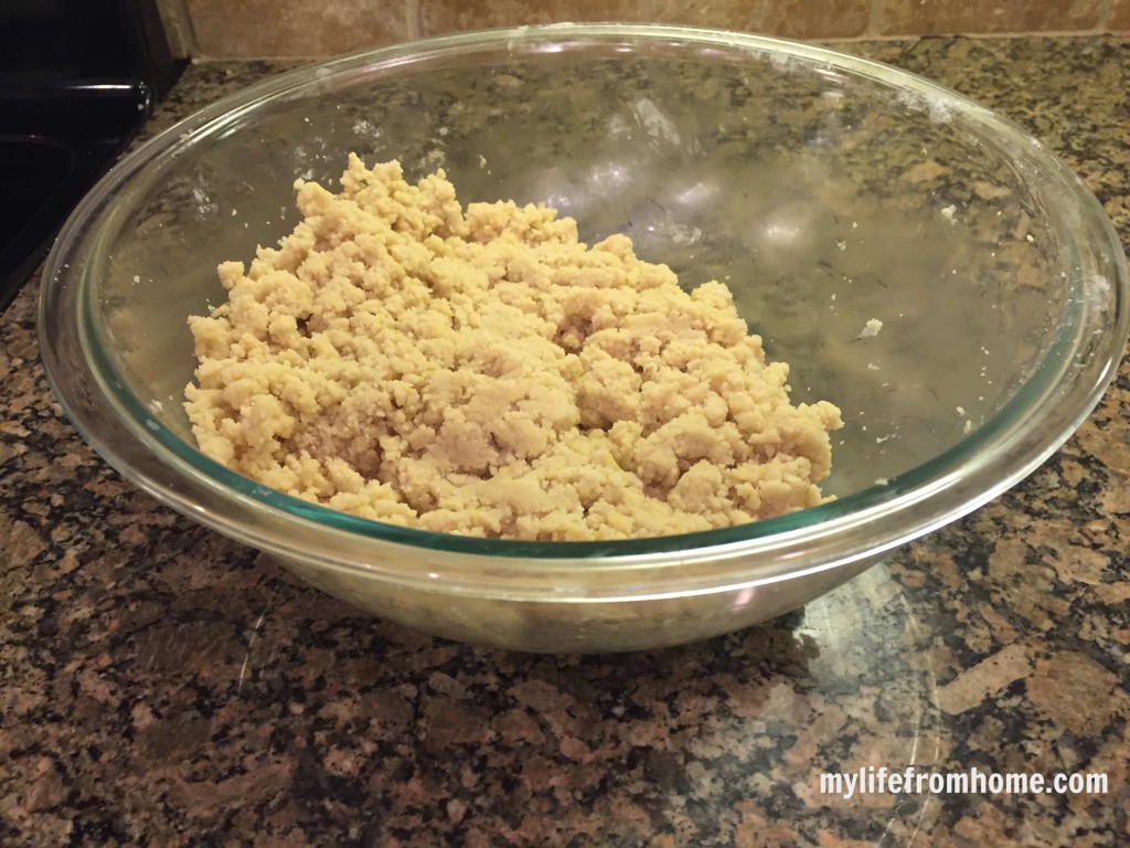 Vanilla scone cookie dough in a glass mixing bowl ready to be shaped
