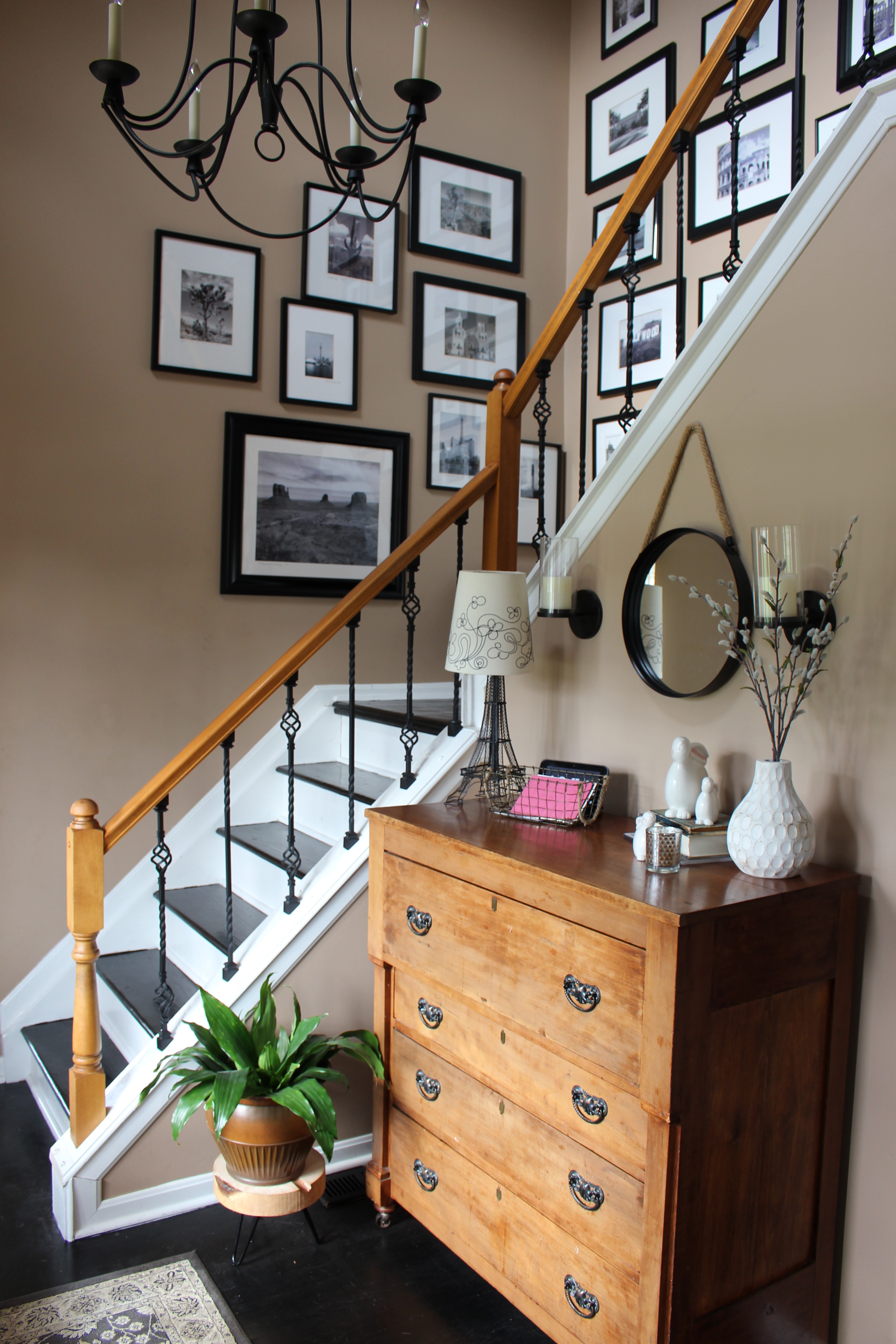Foyer with Travel Gallery Wall by www.whitecottagehomeandliving.com
