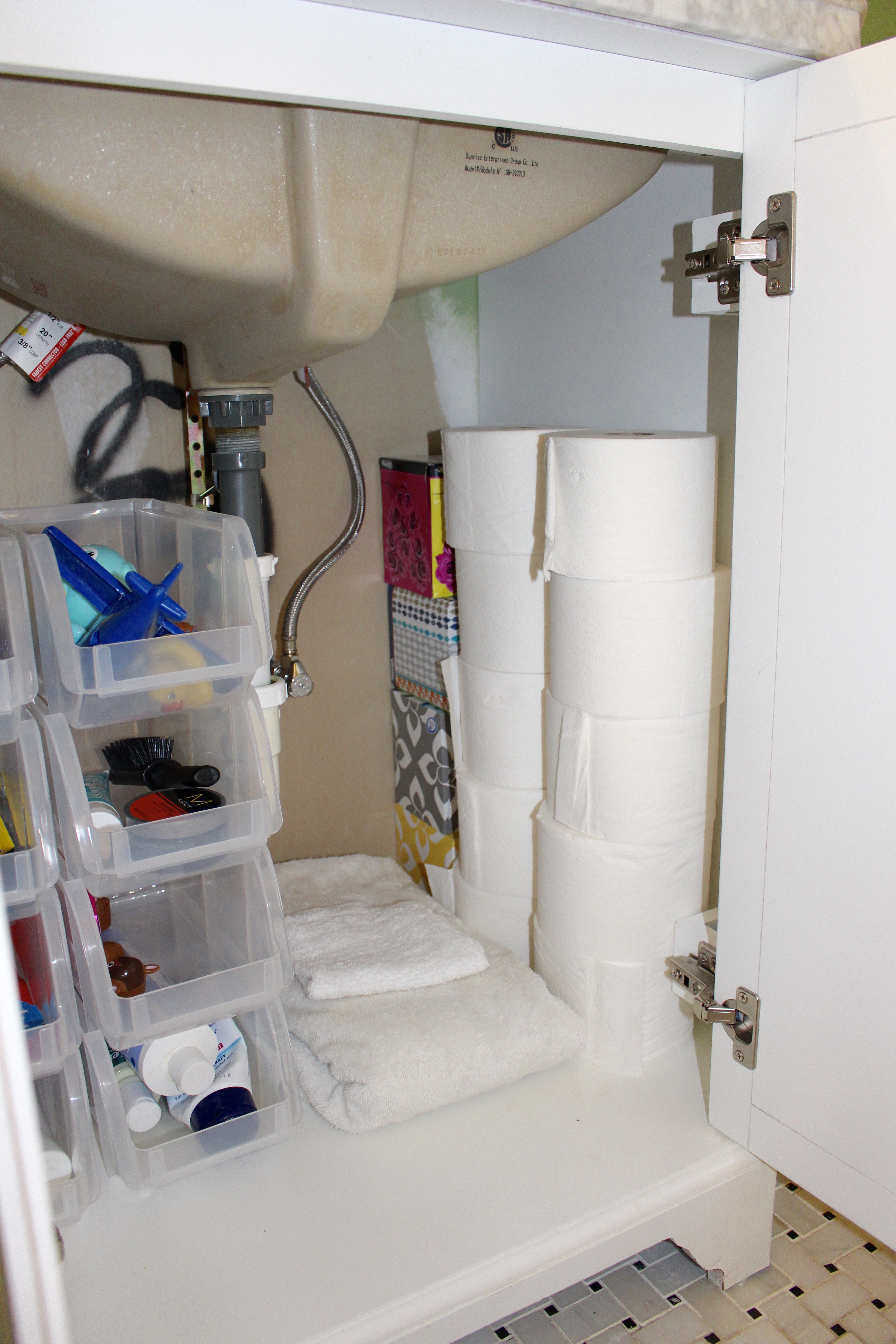 Under the Sink Storage Solutions by www.whitecottagehomeandliving.com