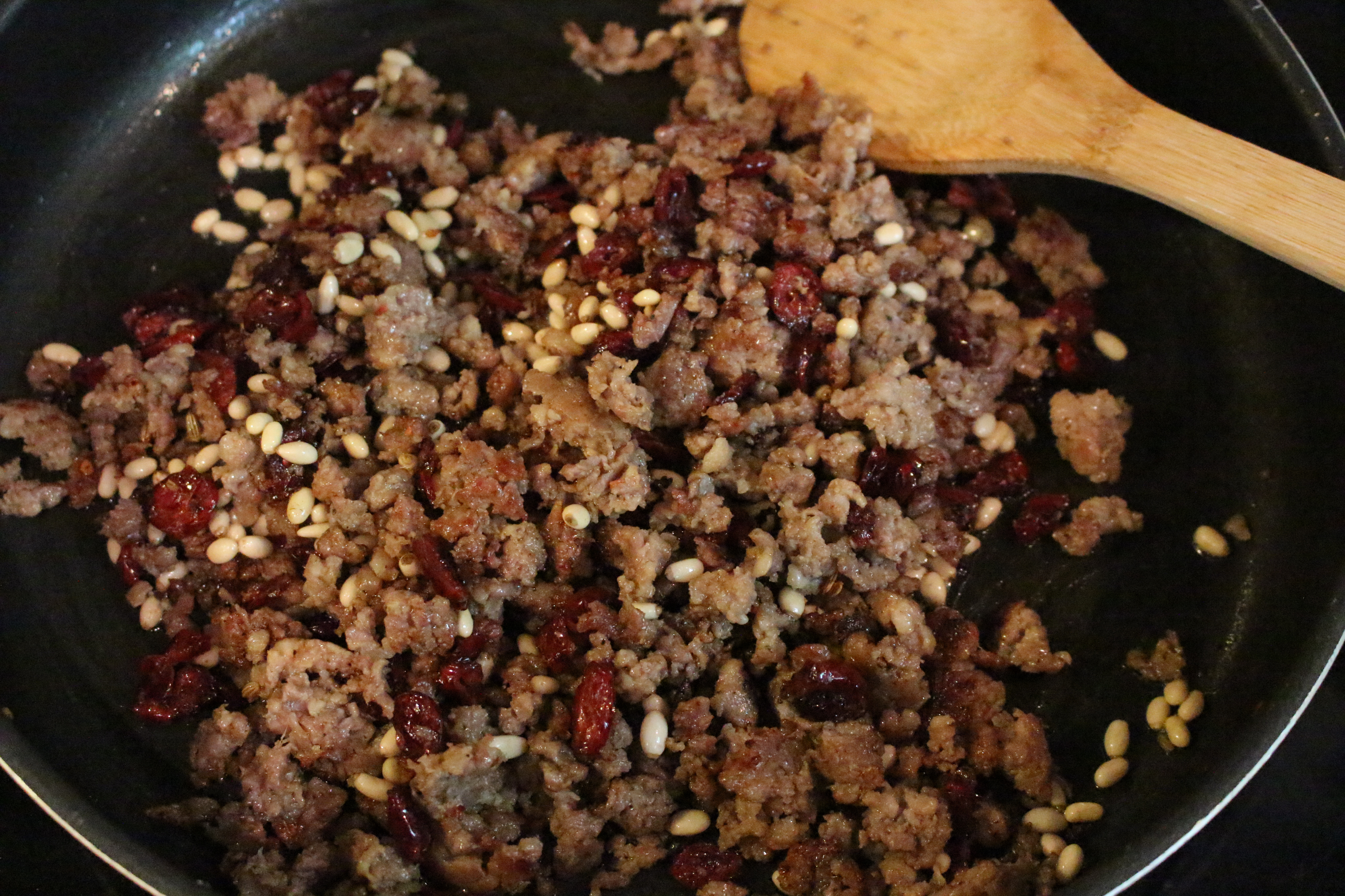 Ground sausage with pine nuts and cranberries by www.whitecottagehomeandliving.com