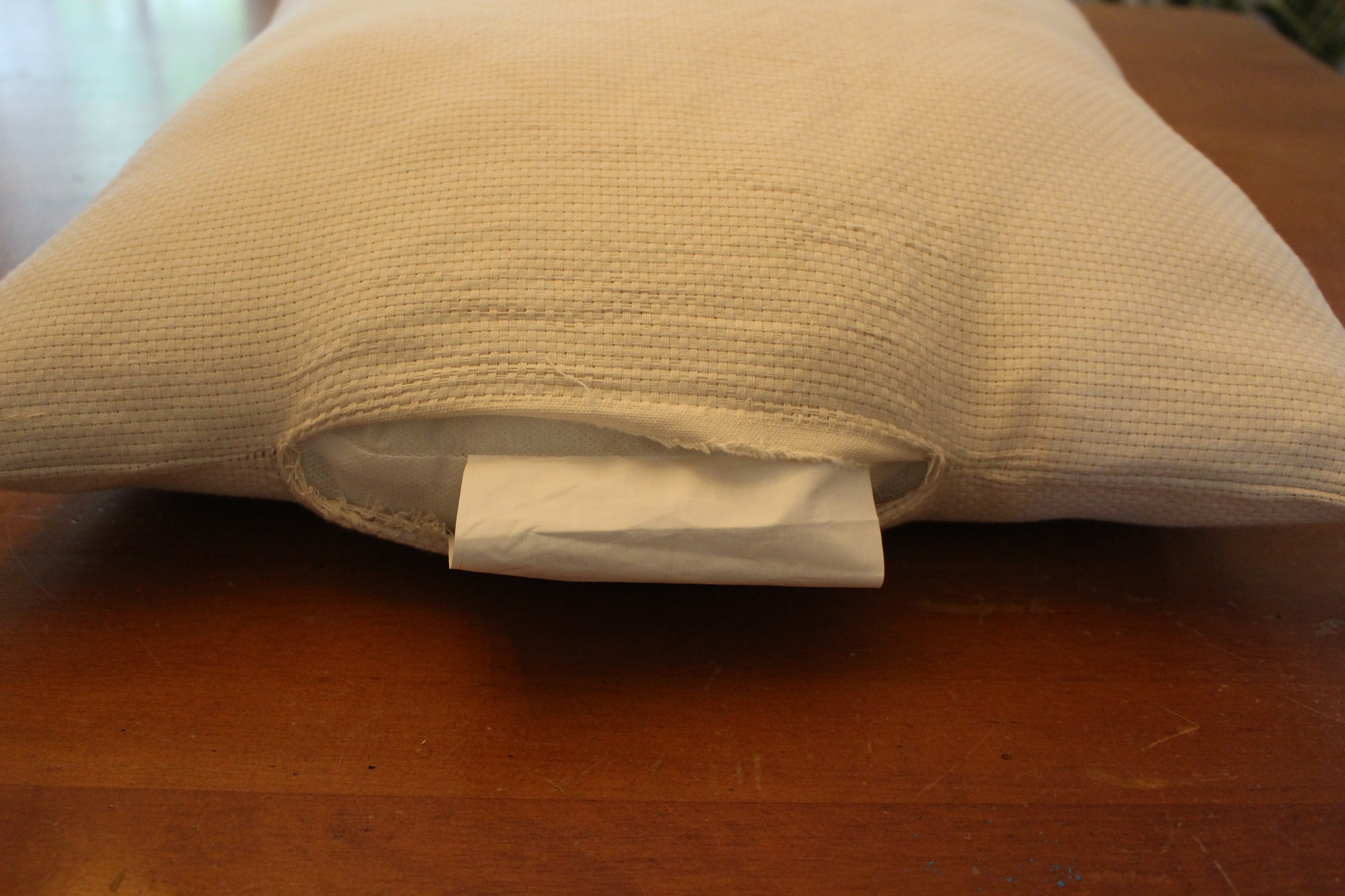 Leave a small opening for inserting your pillow by www.whitecottagehomeandliving.com