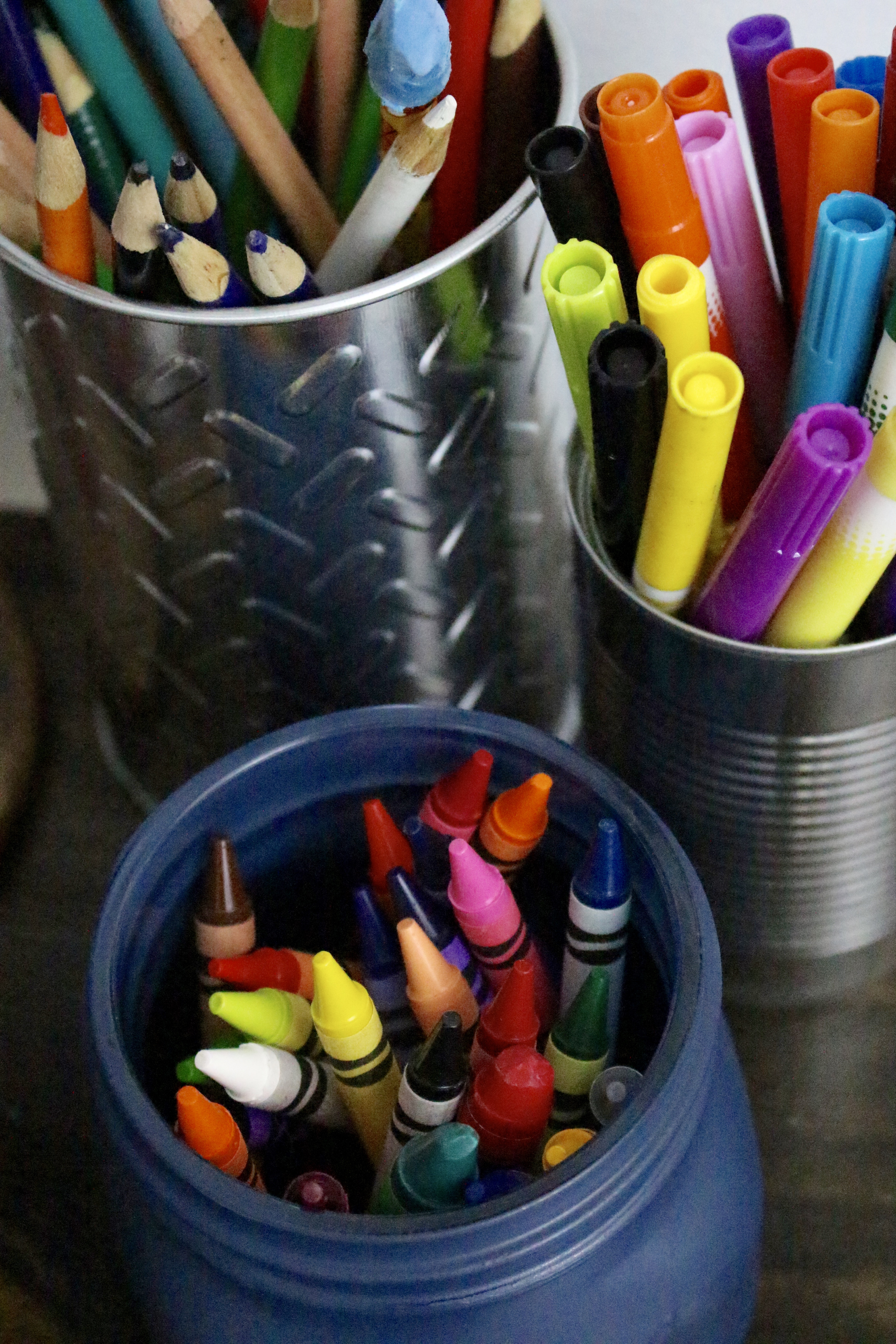 Art supplies in unique containers by www.whitecottagehomeandliving.com