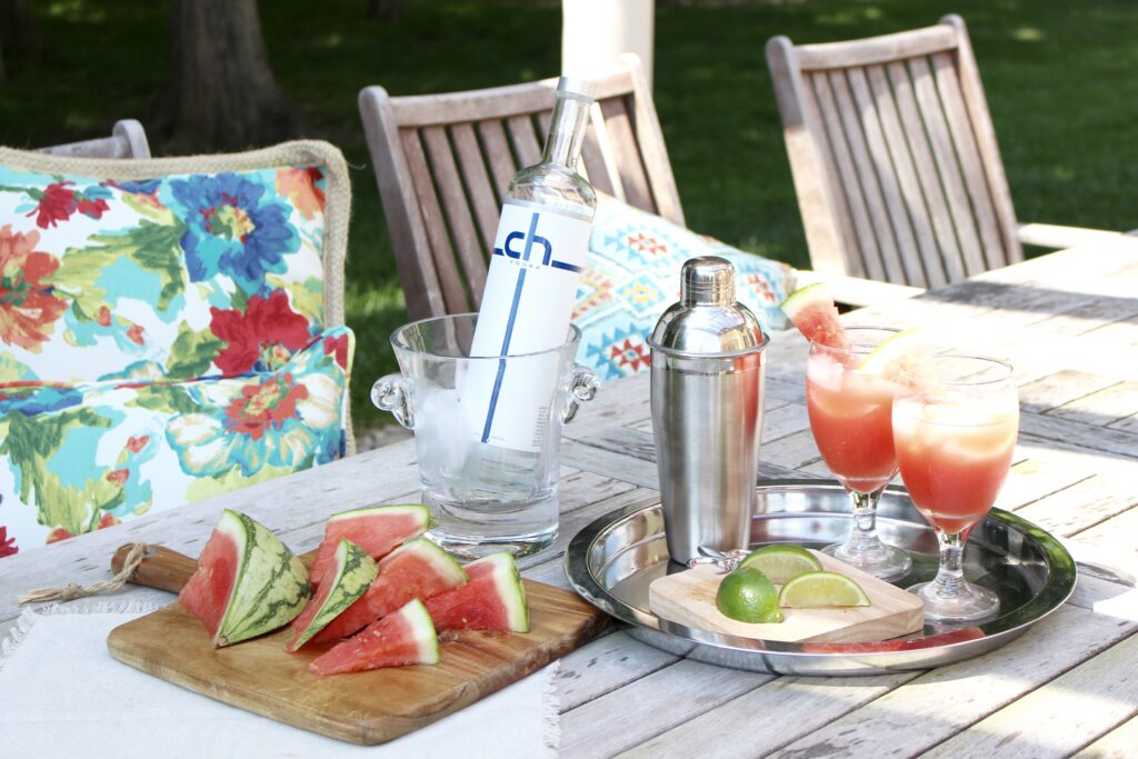 An outdoor party spread set-up with cocktails.
