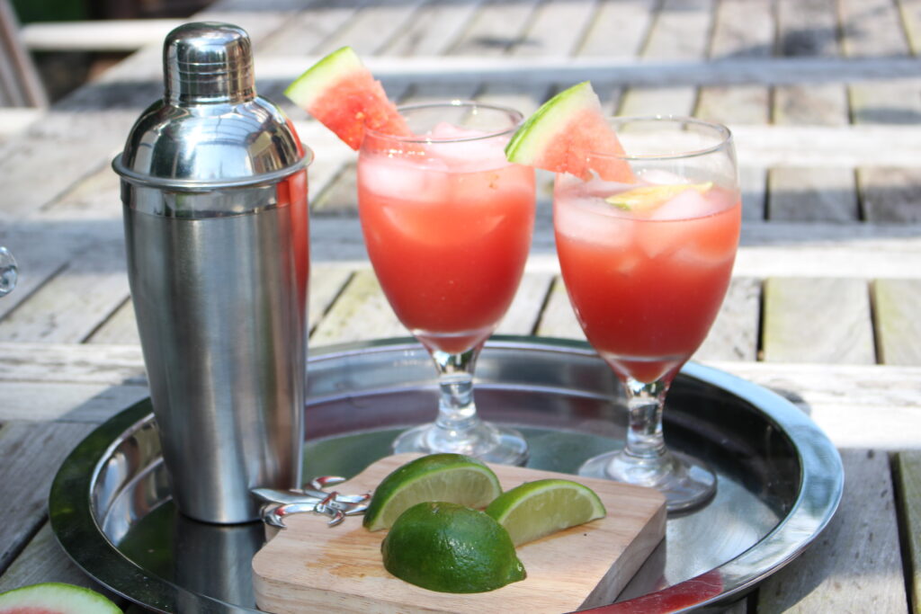 Watermelon Cucumber vodka coolers served outside on a silver tray