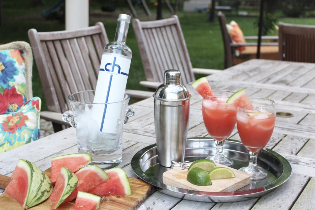 watermelon cucumber cocktails served on an outside table with CH Vodka