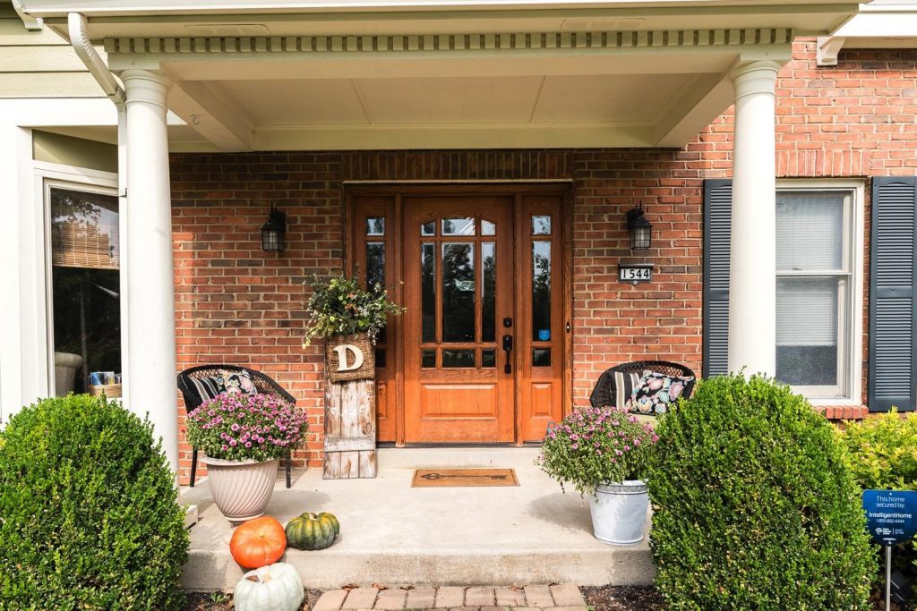 Whole House Tour- Photo by Justin Sheldon Photography- home design, room decor ideas- DIY- DIY projects- exterior of home- wood door- front porch- fall porch