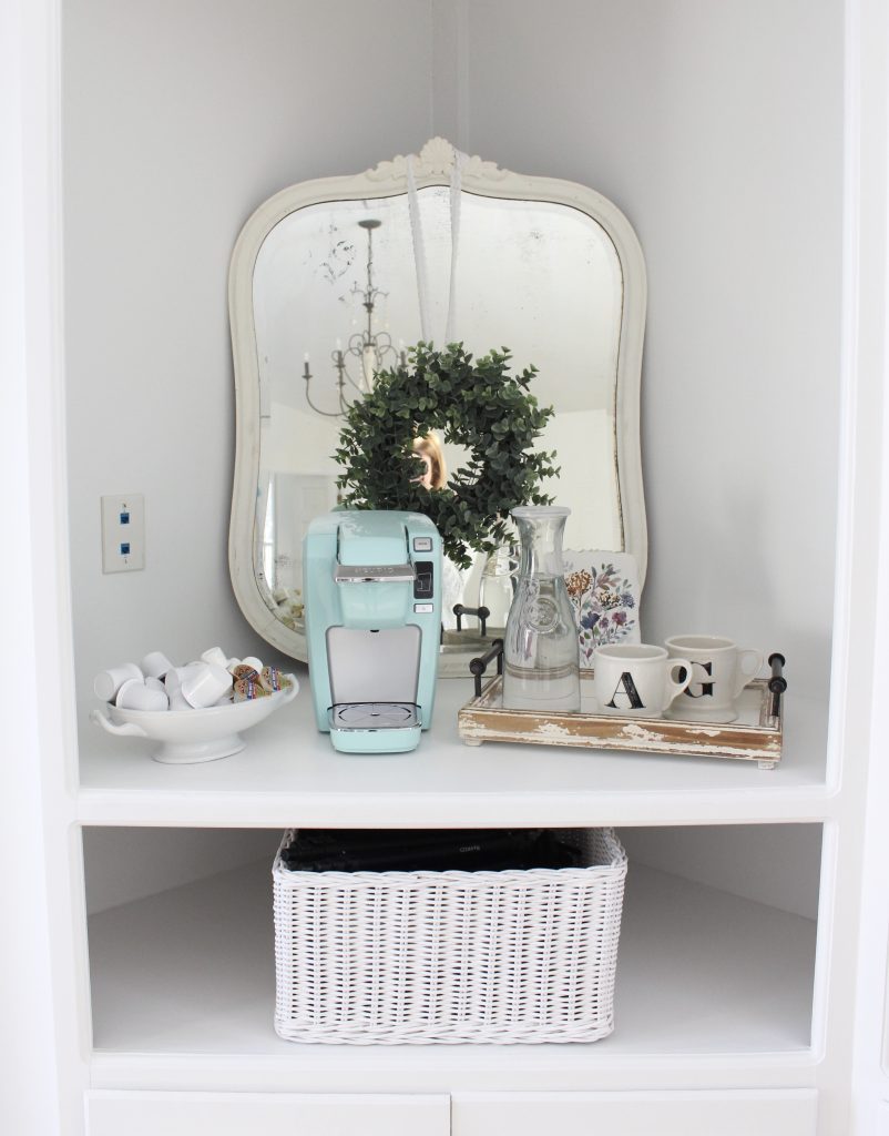 White Cottage Style Bedroom with bookcases- shabby chic style- cottage style- coffee station- bedroom design- how to style a coffee station- bookcase- DIY- DIY projects- Keurig- mint green coffee maker- white bedroom decor- room design- styling a bookcase