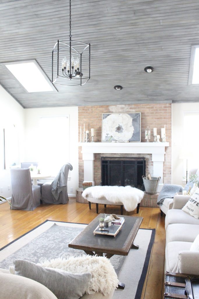 Gray and White Cottage Living Space- farmhouse style room- decor- DIY- weathered wood ceiling treatment- painted ceiling- paint and stain treatment on pine- how to- paint- stain- wood- ceiling- winter decor- room design- home decor- living room decorating ideas- rustic home decor- wall decorating ideas- decoration ideas- room decor ideas- mantel ideas- french county style decor-tv room