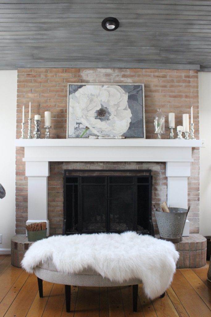 Gray and White Cottage Living Space- farmhouse style room- decor- DIY- weathered wood ceiling treatment- painted ceiling- paint and stain treatment on pine- how to- paint- stain- wood- ceiling- winter decor- room design- home decor- living room decorating ideas- rustic home decor- wall decorating ideas- decoration ideas- room decor ideas- mantel ideas- french county style decor-tv room- winter decor