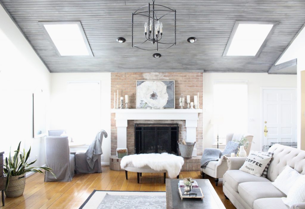 Gray and White Cottage Living Space- farmhouse style room- decor- DIY- weathered wood ceiling treatment- painted ceiling- paint and stain treatment on pine- how to- paint- stain- wood- ceiling- winter decor- room design- home decor- living room decorating ideas- rustic home decor- wall decorating ideas- decoration ideas- room decor ideas- mantel ideas- french county style decor-tv room- cottage style home