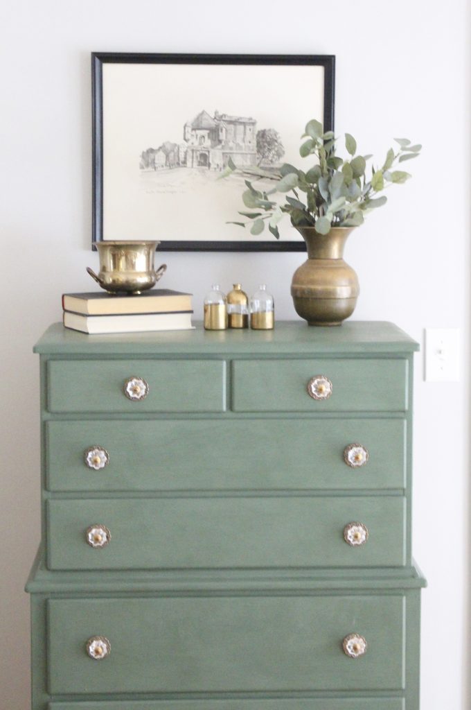 A wood dresser painted green- Amy Howard paints- One step paint- green- Cherbourg- how to use chalk paint- chalk painted finish- green furniture- how to paint furniture- home design- DIY- Do it Yourself project- painted furniture- crystal knobs