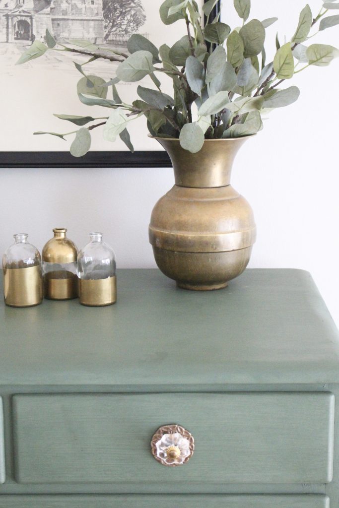 A wood dresser painted green- Amy Howard paints- One step paint- green- Cherbourg- how to use chalk paint- chalk painted finish- green furniture- how to paint furniture- home design- DIY- Do it Yourself project- painted furniture- gold accessories