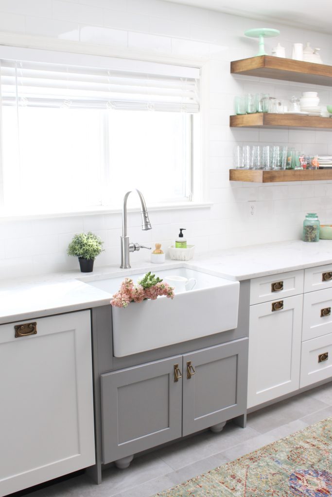 farmhouse sink- Elkay Fireclay Sink- cottage kitchen renovation- extra deep sink- white- kitchen renovation- single bowl sink- undermount farmhouse sink- kitchen- gray cabinets- white cottage kitchen- makeover- home design- room inspiration- Explore faucet- one hole faucet- pull-down sprayer