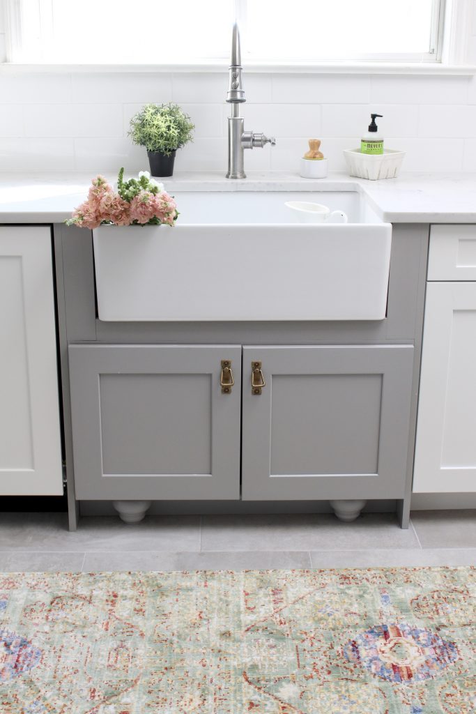 farmhouse sink- Elkay Fireclay Sink- cottage kitchen renovation- extra deep sink- white- kitchen renovation- single bowl sink- undermount farmhouse sink- kitchen- gray cabinets- white cottage kitchen- makeover- home design- room inspiration- Explore faucet- one hole faucet- pull-down sprayer