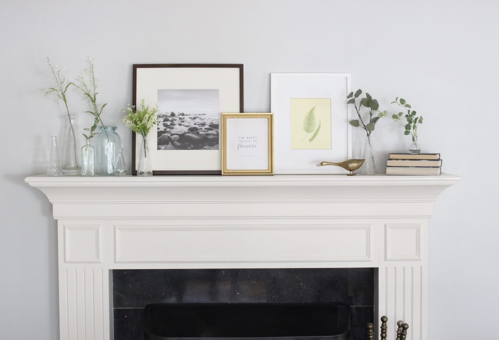 spring mantel decor- how to decorate your mantel for spring- mantles- mantel decorating- spring decor- fresh spring ideas- layered frames- wall decorating ideas- home design- diy- diy projects- seasonal mantel decor