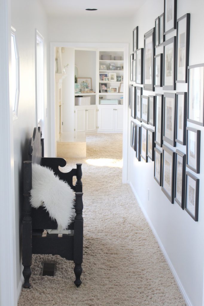 travel gallery- wall gallery- travel photos- how to display- hallway decorating- long hallway- decor- wall decor- black and white photographs- master suite- hallway decor- bedroom decor