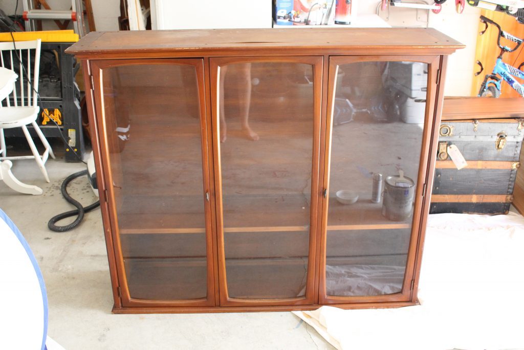 Hutch cabinet makeover- DIY- green- paint- cabinet- Do it Yourself projects- painted furniture- turning a hutch into a cabinet with legs- adding legs to furniture- dining room- furniture- storage piece- mirror spray paint- home decor- room design