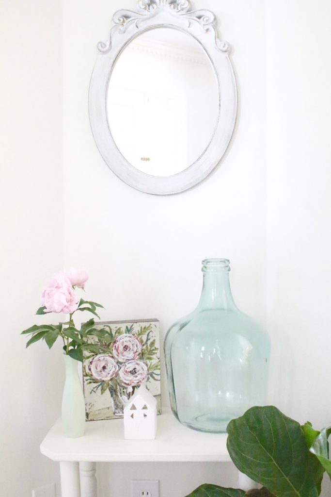 peony- flowers- gardening- vignette- how to - decorate- an entryway- entryway ideas- home decor- using flowers in decorating- faux milk glass- fiddle fig leaf- demijohn bottles- flower artwork- home design- painted furniture- foyer