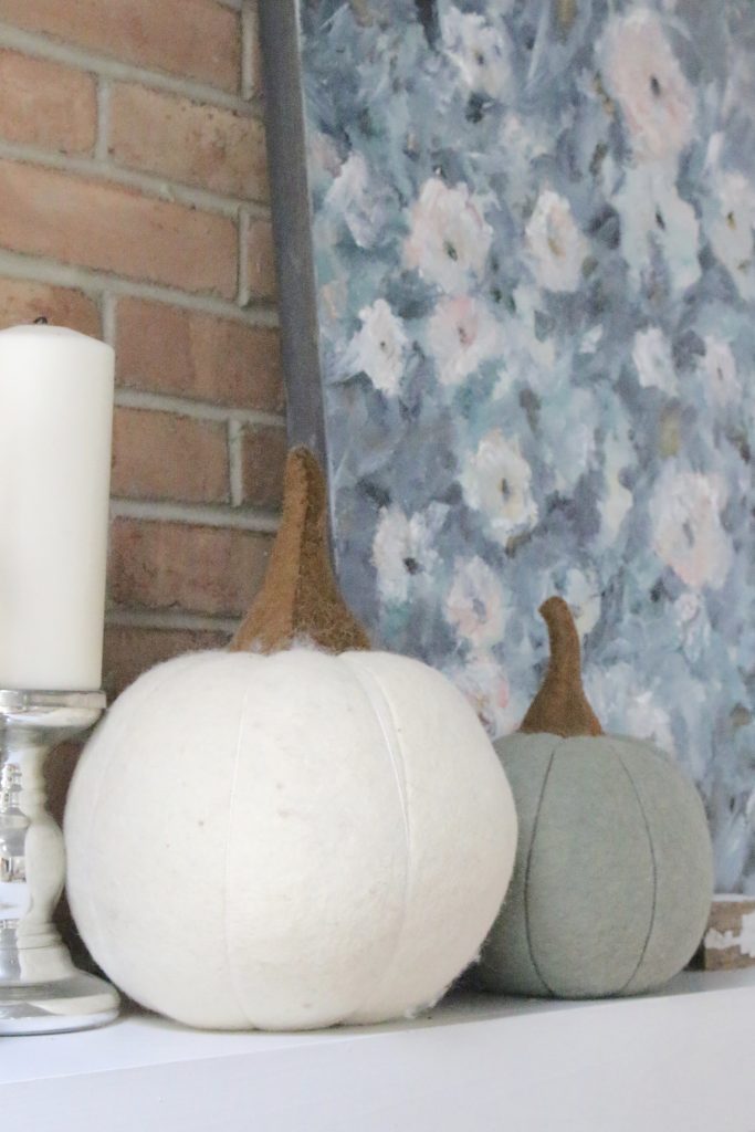 Fall pastels in our family room- pastel colors- neutrals- decorating for fall with pastel- seasonal decor- fall- autumn- living space- room design- wall decor- fall decor- pink- green- gray for autumn- decorating- decor ideas- non traditional colors for fall- white pumpkins