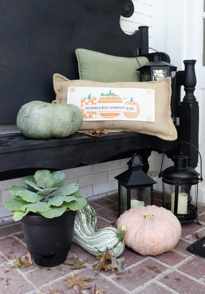 White brick ranch home- fall decor- decorating a small porch for fall- cottage home- outdoor decorating- home design- autumn decor- pumpkins- mums- front porch- handmade wreath- decorating with black and white- seasonal pillow