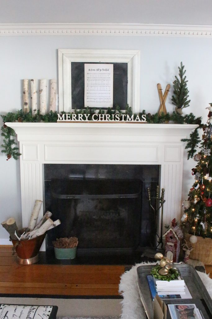 Rustic Christmas Mantel- greenery- birch- animal ornaments- wood- garland- wicker basket- chalkboard- song sheet- mantel- mantles
