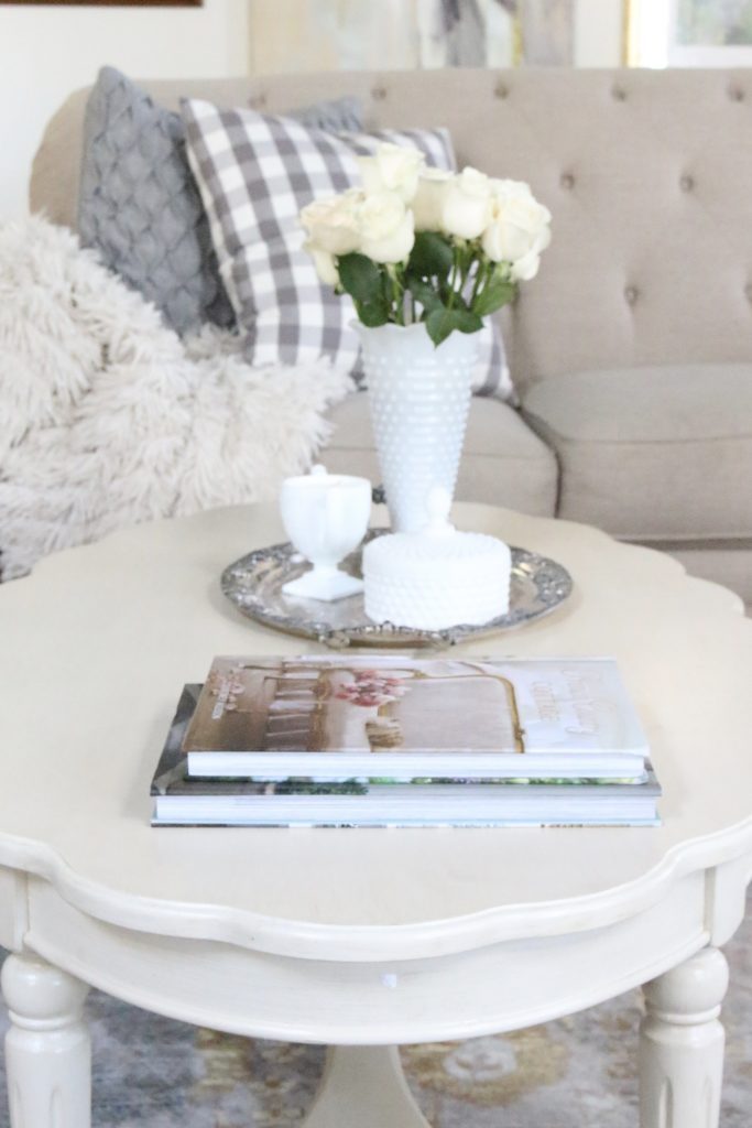coffee table decor- scalloped edge- French country look- cottage style decor- coffee table styling- spring- pastel- milk glass- vintage items