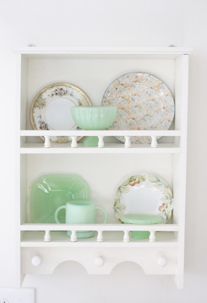 A cute little wood plate shelf- plate rack- wood shelf- jadeite- vintage china- thrifted plates- peninsula- kitchen decor- kitchen decorating- cottage kitchen decor