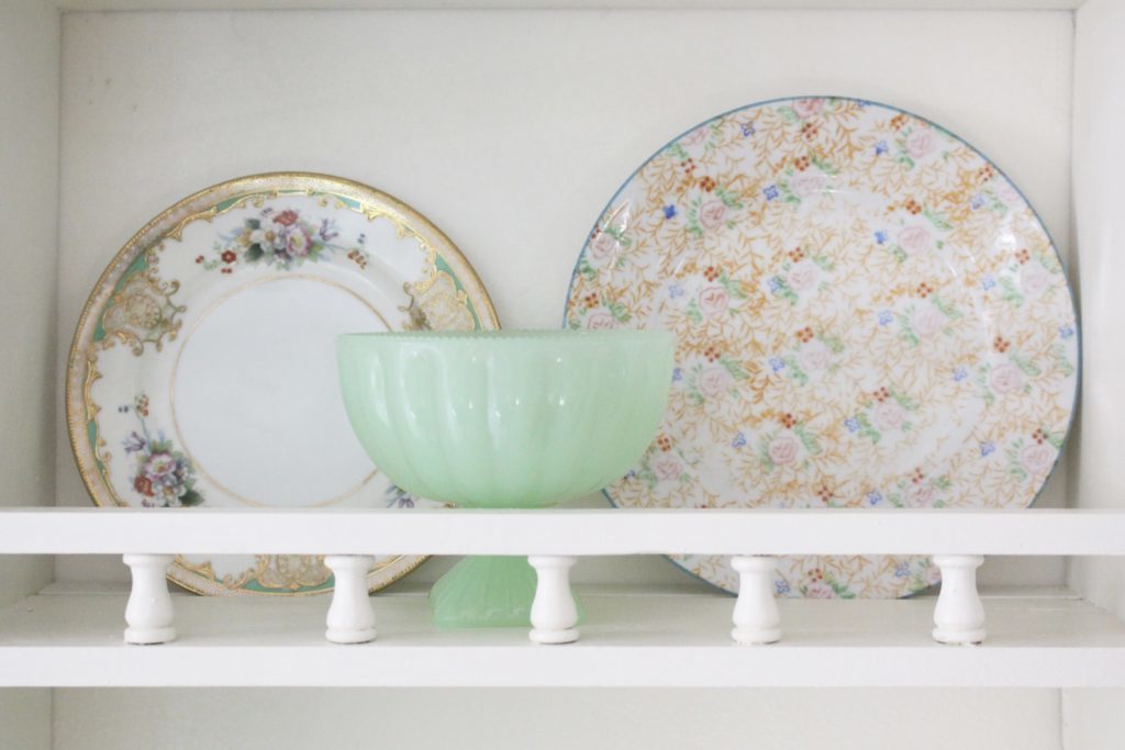 A cute little wood plate shelf- plate rack- wood shelf- jadeite- vintage china- thrifted plates- peninsula- kitchen decor- kitchen decorating- cottage kitchen decor- thrifted dishes