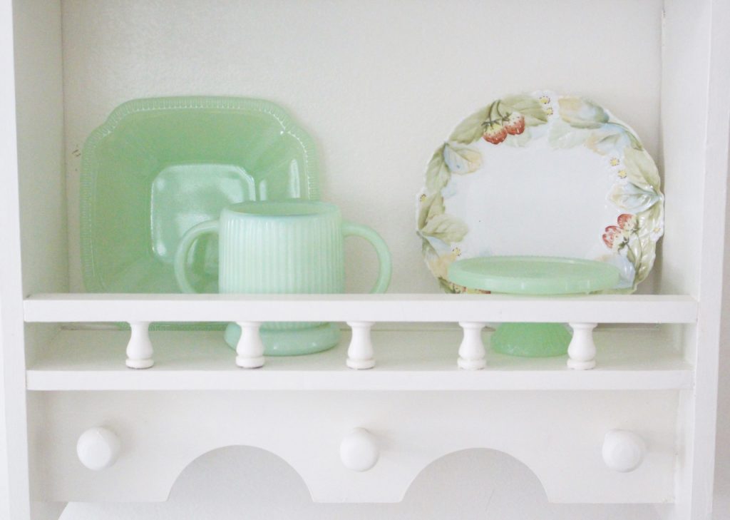 A cute little wood plate shelf- plate rack- wood shelf- jadeite- vintage china- thrifted plates- peninsula- kitchen decor- kitchen decorating- cottage kitchen decor- wood shelf