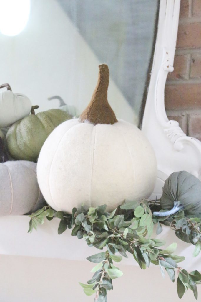 Decorating for fall with Subtle Colors- fall decor with pastel colors- pastel colors- green- gray for fall- living room fall decor- mantel decor for fall- subtle fall- simple fall decorations- wool pumpkins- pumpkin display
