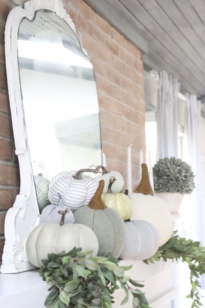 Decorating for fall with Subtle Colors- fall decor with pastel colors- pastel colors- green- gray for fall- living room fall decor- mantel decor for fall- subtle fall- simple fall decorations- displaying pumpkins on a mantel