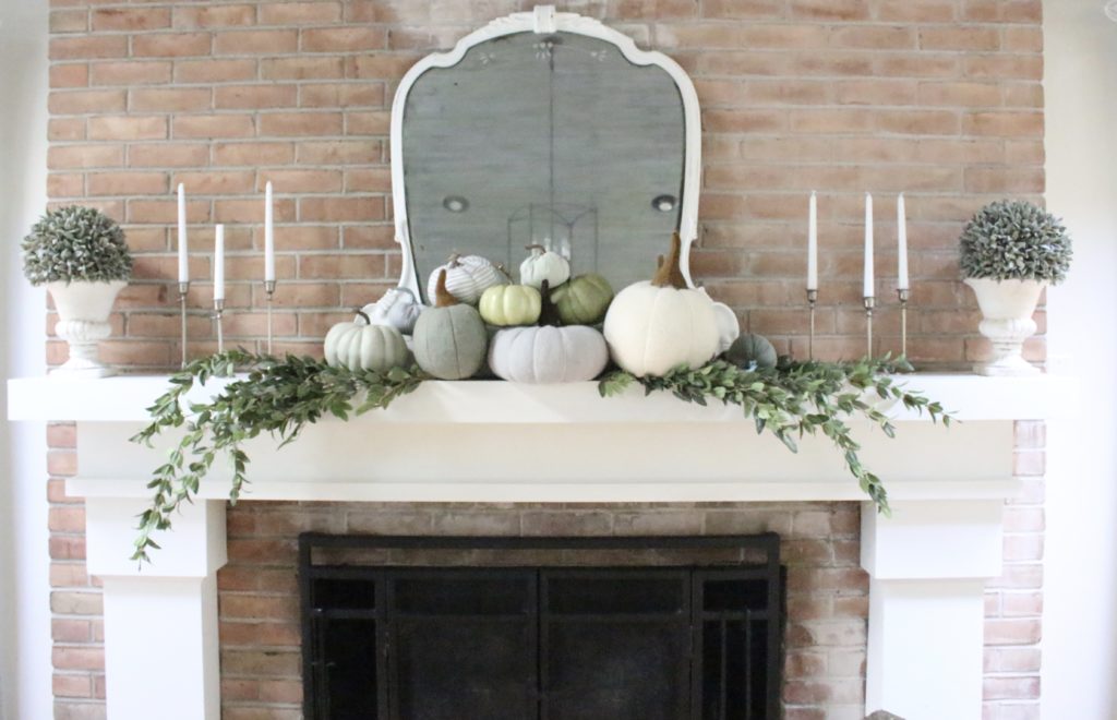 Decorating for fall with Subtle Colors- fall decor with pastel colors- pastel colors- green- gray for fall- living room fall decor- mantel decor for fall- subtle fall- simple fall decorations- pumpkins on display