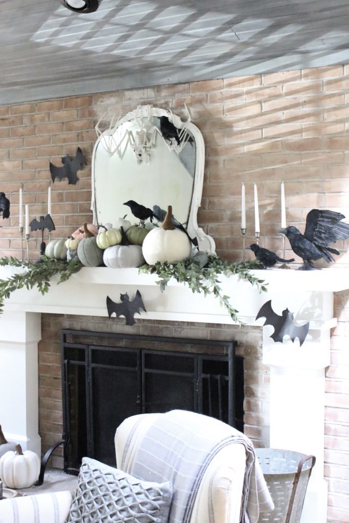 Fall Mantel Updated for Halloween- halloween mantel- crows- bat skeleton- pumpkins- pumpkin patch mantel- cottage style- halloween decor- fireplace decor- decorations for Halloween