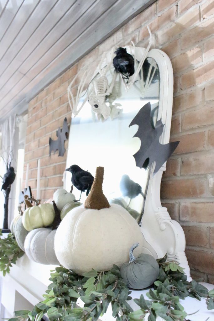 Fall Mantel Updated for Halloween- halloween mantel- crows- bat skeleton- pumpkins- pumpkin patch mantel- cottage style- halloween decor- fireplace decor- decorations for Halloween