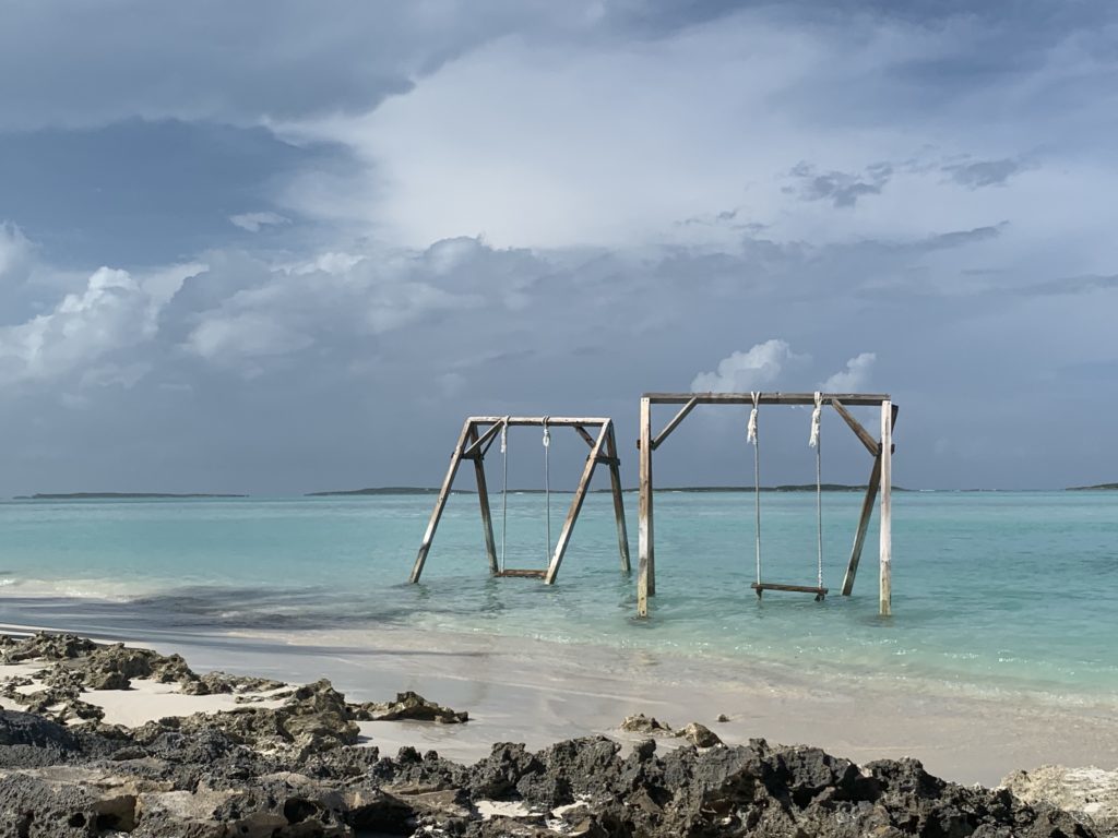 Exuma- Bahamas- swimming with the pigs- swimming pigs- vacation- family vacation- trip- beaches- Caribbean- Grand Isle Resort- Coco Plum Beach, ocean- beach swing