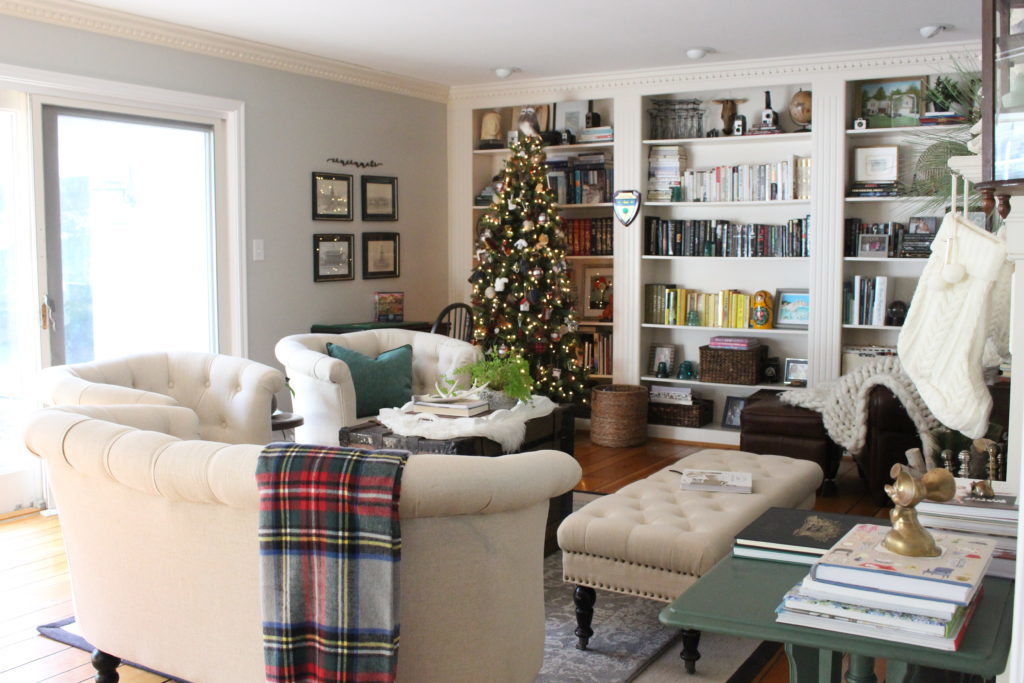 Christmas Cheer in our Library- plaid- traditional Christmas- holiday decor- holiday decorating- seasonal decor- animal ornaments- Christmas decorating- decorating with animal ornaments- brass- green- living room decorating