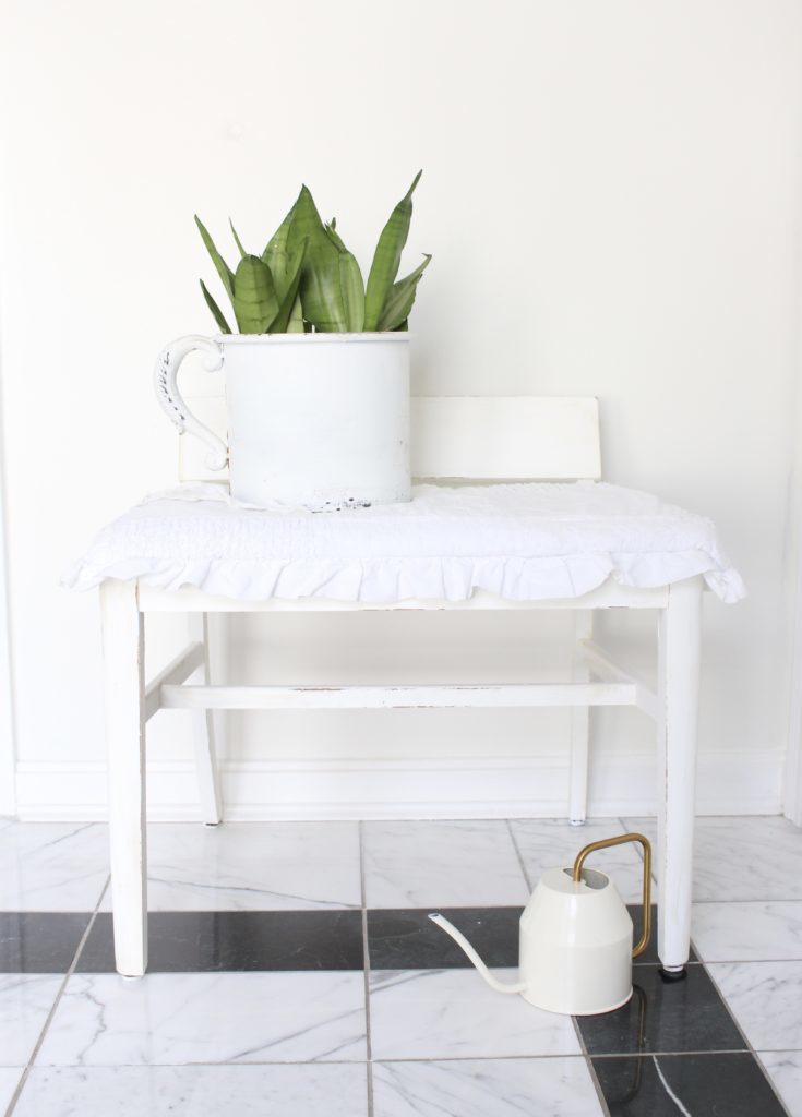 Painting and Recovering a Thrift Store stool- painted furniture- shabby chic decor- chalk paint- how to use chalk paint to update thrift store finds- thrift store makeover- vintage stool- white painted furniture- easy reupholstering- pillowcase as a seat cover