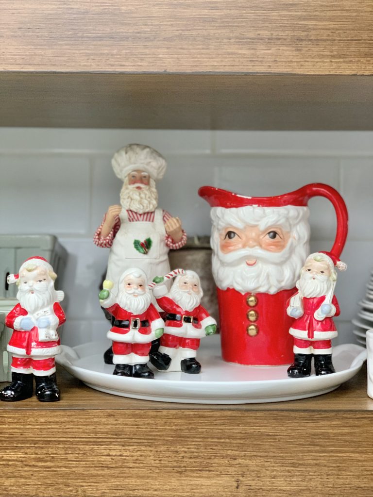 Vintage Santas displayed on our kitchen shelves- display- Santa collection- vintage Santas- Santa mugs- display- open kitchen shelving