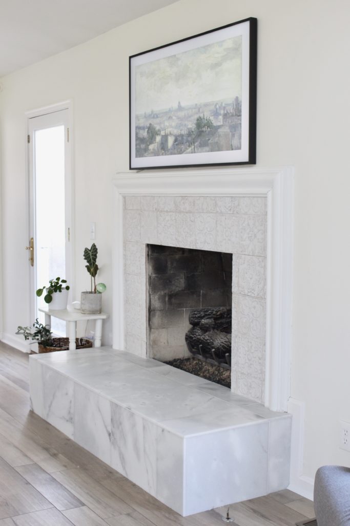 Marble fireplace in master bedroom
