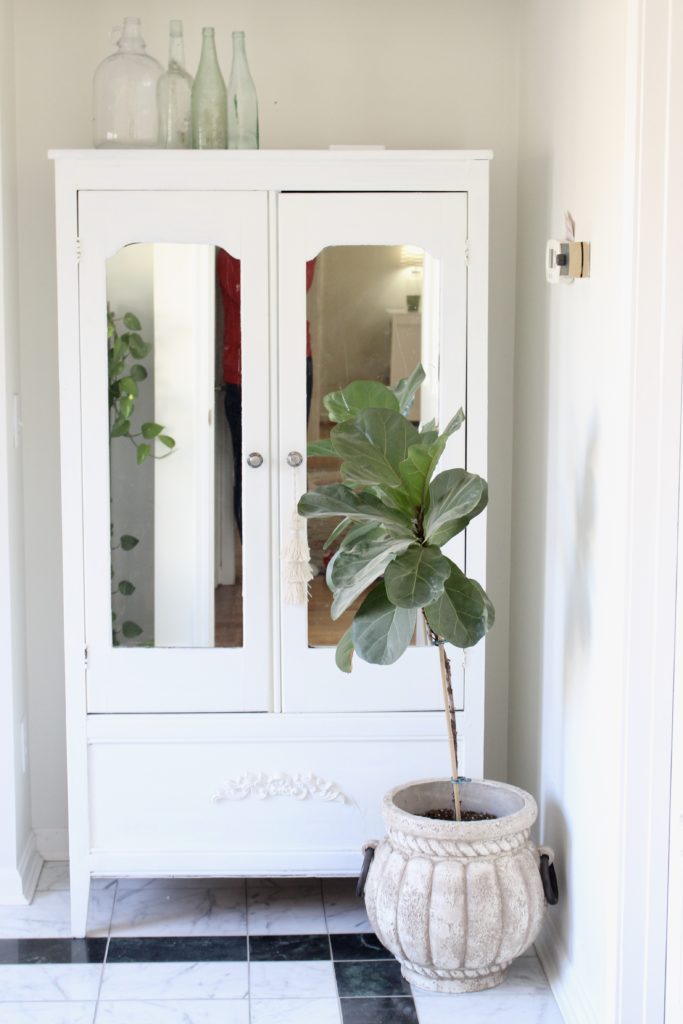 Bright and airy master bedroom reveal with fig tree