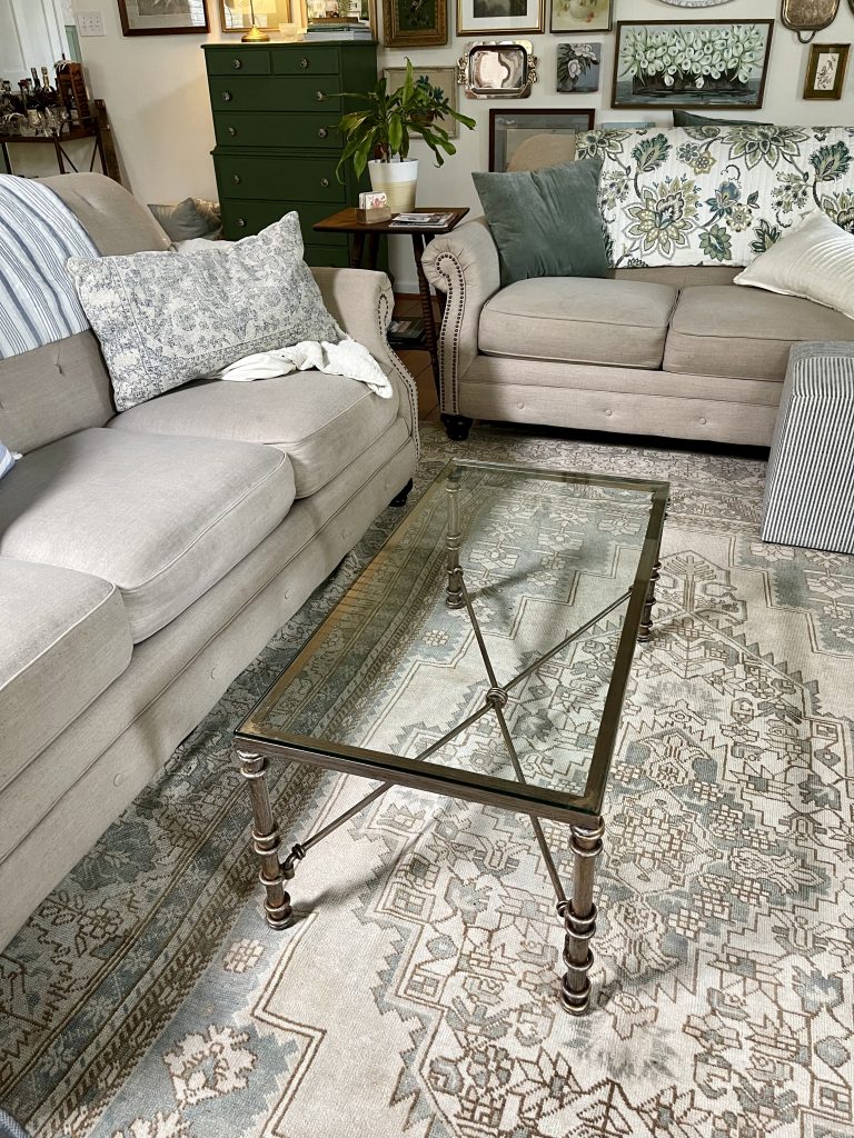 Unstyled finished glass and metal coffee table
