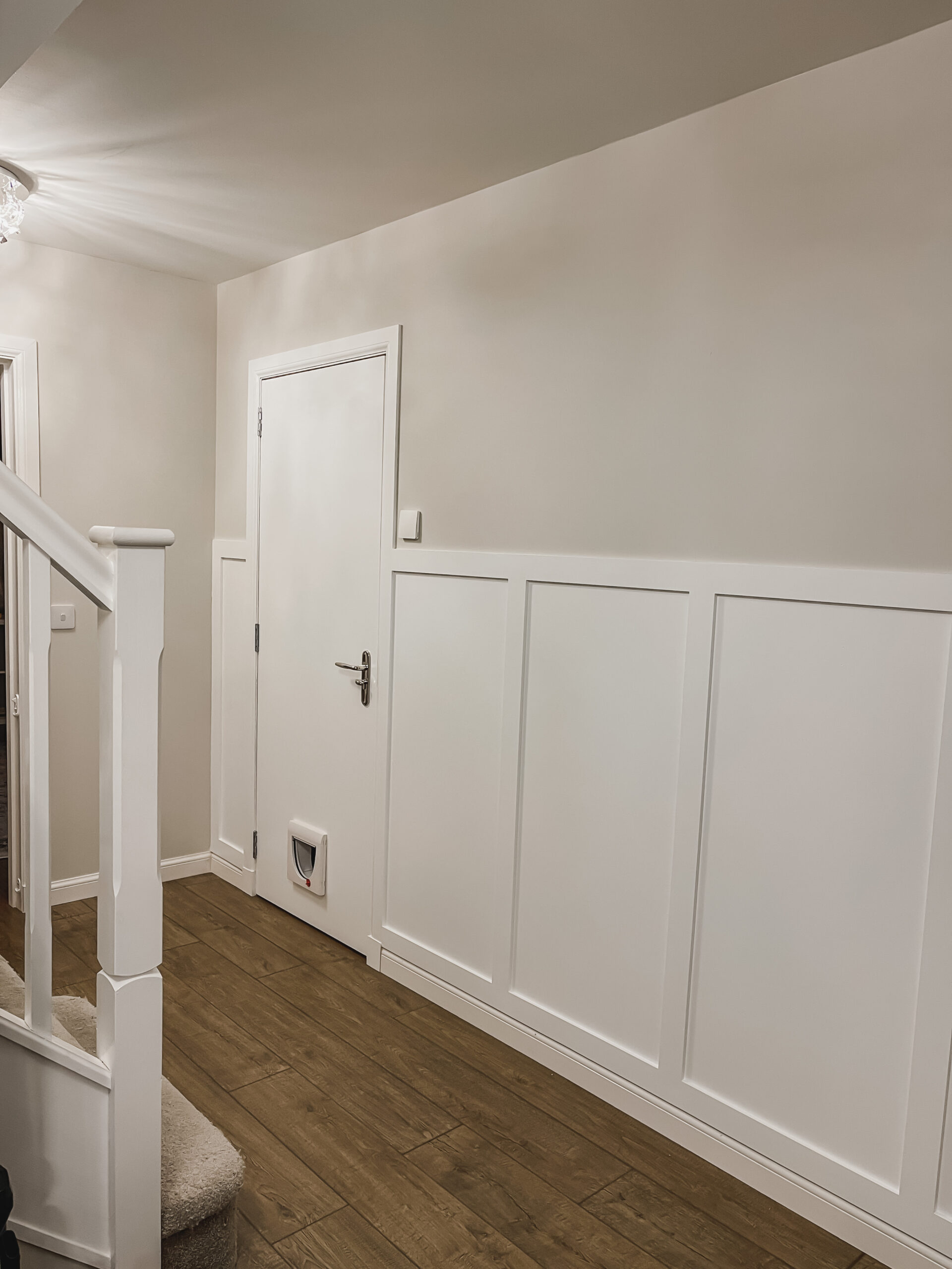 wainscotting and painting the hallway