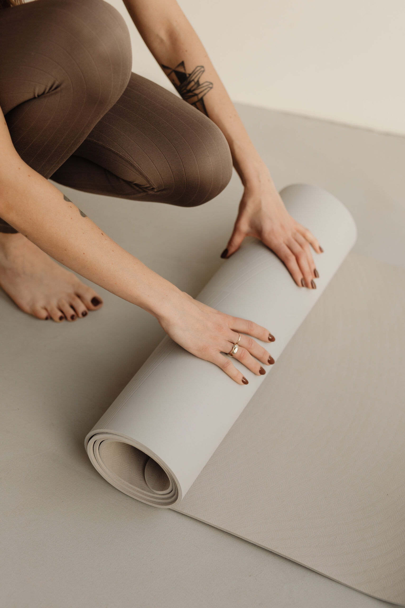 woman with yoga mat
