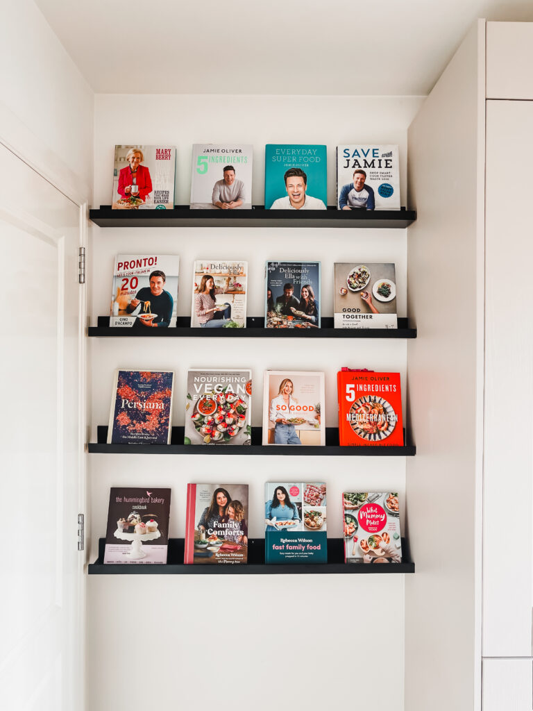 DIY kitchen nook with Ikea shelves filled with cookbooks