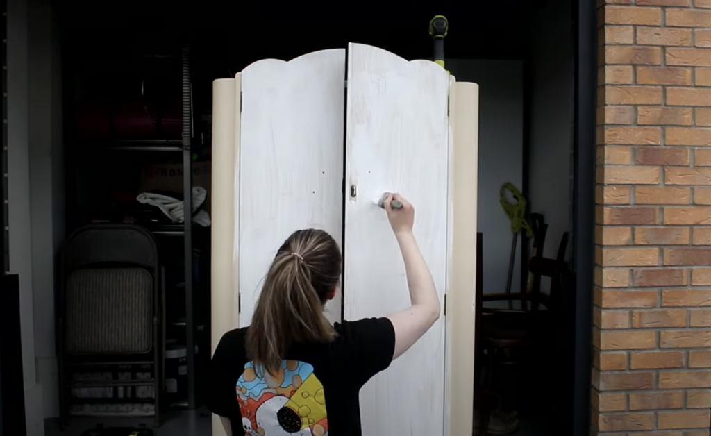 applying the coat of primer to the vintage wardrobe