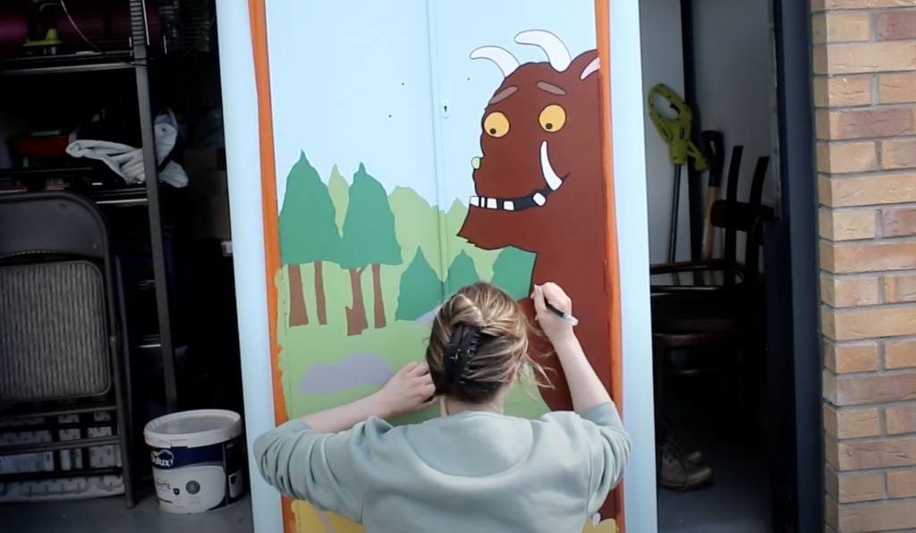 Outlining the Gruffalo mural