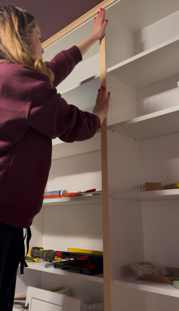 fitting vertical trim on a built in bookcase